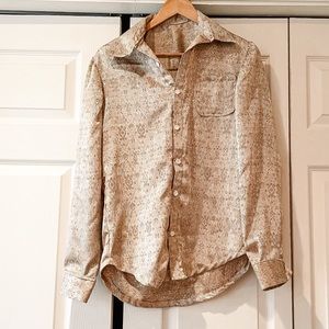 • handmade golden button up top •